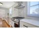 Renovated kitchen, marble countertops, stainless steel appliances, hardwood floors at 1328 Cottonwood St, Charleston, SC 29403