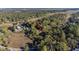 Aerial view showing a house nestled in a wooded area near water at 1507 Marsh Haven, Seabrook Island, SC 29455