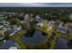 Aerial of house near pond at dusk at 172 Sea Cotton Cir, Charleston, SC 29412