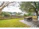 Relaxing backyard patio with pond views and wooden fence at 172 Sea Cotton Cir, Charleston, SC 29412