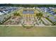 Aerial view of community park with playground, pond, and seating areas at 178 Garden Lily Ln, Summerville, SC 29485