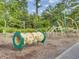 playground with swings, slides, and climbing equipment at 178 Garden Lily Ln, Summerville, SC 29485