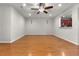 Spacious living room with hardwood floors and ceiling fan at 1819 Heldsberg Dr, Charleston, SC 29414