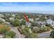 Aerial view of a house and surrounding neighborhood, near the ocean at 2264 Seascape Ct, Seabrook Island, SC 29455