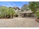 Covered carport attached to the house with gravel area at 2264 Seascape Ct, Seabrook Island, SC 29455