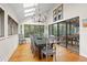 Charming dining room with a large table, skylights, and access to a deck at 2264 Seascape Ct, Seabrook Island, SC 29455