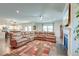 Open concept living room featuring a large sectional sofa and hardwood floors at 2840 Conservancy Ln, Charleston, SC 29414