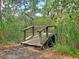 Rustic wooden footbridge in a lush green setting at 2840 Conservancy Ln, Charleston, SC 29414