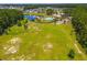 Aerial view of community amenities including pool, park, and pond at 309 Blue Shadows Ct, Summerville, SC 29486