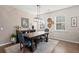 Dining room with wood table, chairs and decorative wall at 309 Blue Shadows Ct, Summerville, SC 29486