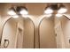 Bathroom with arched mirrors and modern lighting at 42 Summer Dr, Walterboro, SC 29488