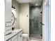 Bathroom features a single vanity, granite countertop, and a large walk-in shower at 42 Summer Dr, Walterboro, SC 29488
