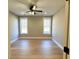 Bright bedroom with hardwood floors and two windows at 42 Summer Dr, Walterboro, SC 29488