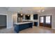 Modern kitchen with dark cabinets, quartz countertops, and stainless steel appliances at 42 Summer Dr, Walterboro, SC 29488