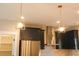 Stylish gold pendant lights above kitchen island at 42 Summer Dr, Walterboro, SC 29488