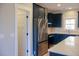 Modern kitchen with stainless steel appliances and dark cabinets at 42 Summer Dr, Walterboro, SC 29488