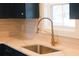 Modern kitchen sink with gold faucet and marble countertop at 42 Summer Dr, Walterboro, SC 29488