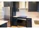 Modern kitchen with stainless steel appliances and dark cabinets at 42 Summer Dr, Walterboro, SC 29488