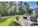 Outdoor patio with fire pit and seating area at 434 Coopers Hawk Dr, Summerville, SC 29483