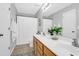 Modern bathroom with double sinks and a large mirror at 527 Tayrn Dr, Wando, SC 29492