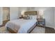 Spacious bedroom with a queen-size bed and walk-in closet at 5540 Dalmore Dr, Ravenel, SC 29470