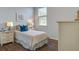 Charming bedroom with a twin-size bed and neutral decor at 5540 Dalmore Dr, Ravenel, SC 29470