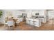 Open concept kitchen with island, stainless steel appliances, and hardwood floors at 5540 Dalmore Dr, Ravenel, SC 29470