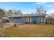 Home's exterior with a spacious backyard at 607 Mountain Pine Road, Moncks Corner, SC 29461