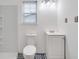 Clean bathroom with white vanity and patterned floor at 607 Mountain Pine Road, Moncks Corner, SC 29461