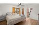 Cozy bedroom with a metal bed frame and yellow curtains at 607 Mountain Pine Road, Moncks Corner, SC 29461