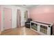 bedroom with pink walls and crib at 607 Mountain Pine Road, Moncks Corner, SC 29461