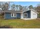 Ranch style home with new siding and landscaping at 607 Mountain Pine Road, Moncks Corner, SC 29461