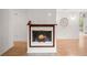 Cozy fireplace with a white tile surround at 607 Mountain Pine Road, Moncks Corner, SC 29461