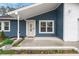 Front entrance with a white door and porch at 607 Mountain Pine Road, Moncks Corner, SC 29461