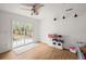 Bright Gathering room with sliding glass doors leading to backyard at 607 Mountain Pine Road, Moncks Corner, SC 29461