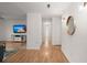 Bright hallway with wood floors and light walls at 607 Mountain Pine Road, Moncks Corner, SC 29461