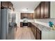 Modern kitchen with stainless steel appliances and granite countertops at 607 Mountain Pine Road, Moncks Corner, SC 29461