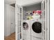 Washer and dryer in a well-lit laundry closet at 607 Mountain Pine Road, Moncks Corner, SC 29461