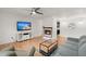 Bright living room with fireplace and hardwood floors at 607 Mountain Pine Road, Moncks Corner, SC 29461