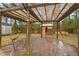 Wooden pergola with a hammock and playhouse at 607 Mountain Pine Road, Moncks Corner, SC 29461