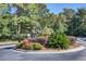 Community entrance with a landscaped fountain at 700 Daniel Ellis Dr # 8302, Charleston, SC 29412