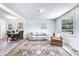 Bright living room with large windows and comfy seating at 754 Sandridge Rd, Dorchester, SC 29437