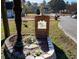 Moss Haven community entrance with brick pillars, landscaping, and pineapple finials at 1007 Moss Haven Ln, Summerville, SC 29483