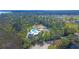 Community pool and clubhouse with surrounding nature at 109 Peninsula Dr, Hollywood, SC 29470