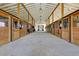 Long aisle leads into the bright interior of a large barn at 109 Peninsula Dr, Hollywood, SC 29470