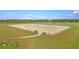 Large riding arena with jumps, perfect for equestrian events at 109 Peninsula Dr, Hollywood, SC 29470