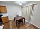 Small dining area with wood table and neutral decor at 116 Barley St, Goose Creek, SC 29445