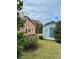 Charming backyard with two sheds and a well-maintained lawn at 12 John St # Includes 8 & 10, Charleston, SC 29403