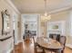 Spacious dining room with hardwood floors and views to living room at 12 John St # Includes 8 & 10, Charleston, SC 29403