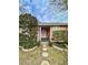 Quaint pink cottage with a welcoming front porch at 12 John St # Includes 8 & 10, Charleston, SC 29403